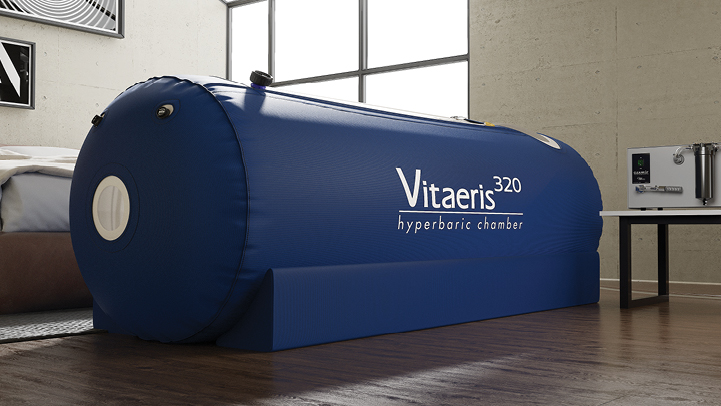 Patient relaxing in hyperbaric oxygen chamber for enhanced healing