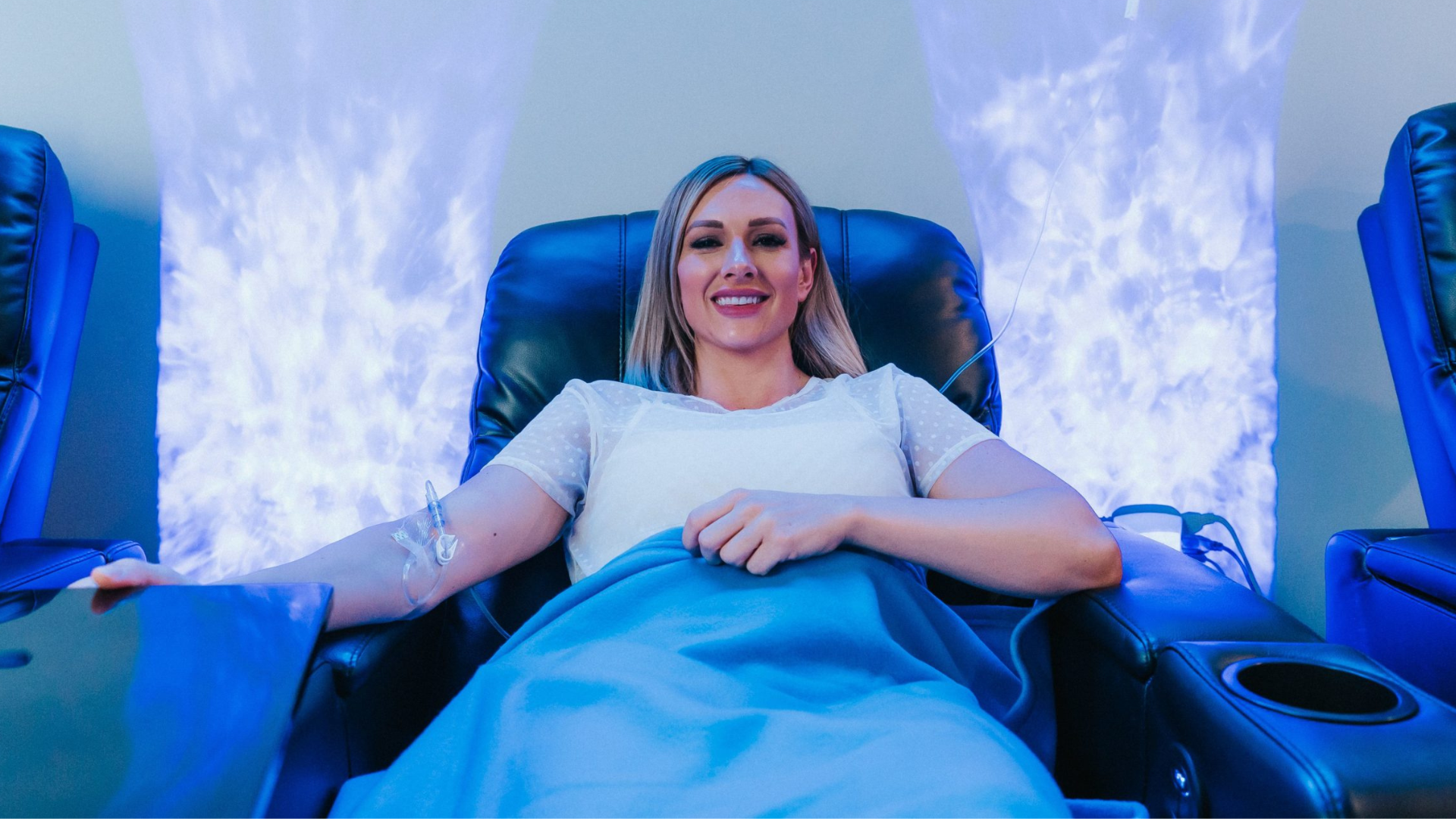 Patient receiving IV vitamin infusion therapy for hydration and wellness
