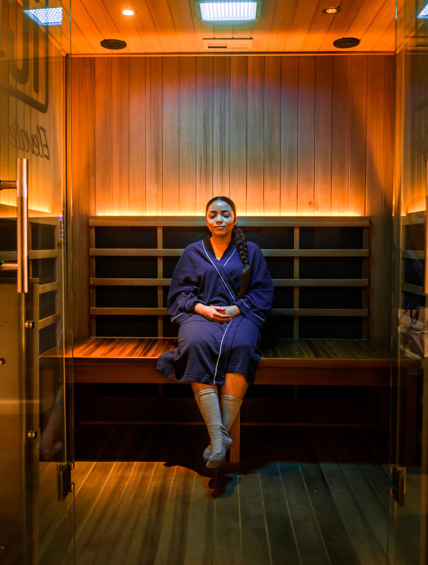 iCRYO Clemson guest relaxing in a private infrared sauna suite